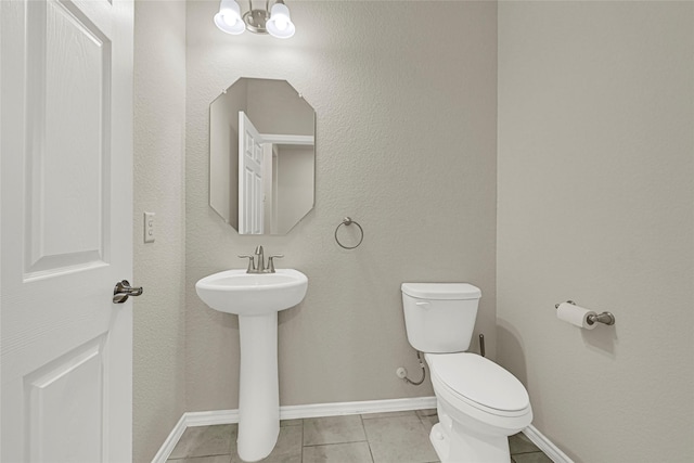 1909 Monaco Memorial Ln, Houston, TX 77043 - half bath with toilet and tile patterned floors