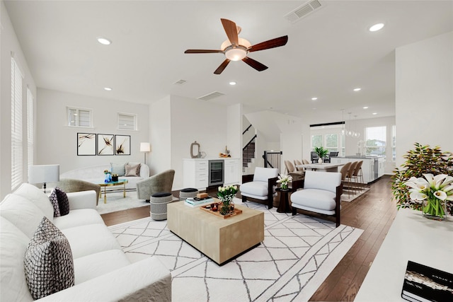 1909 Monaco Memorial Ln, Houston, TX 77043 - living area with wine cooler, light wood-style floors, recessed lighting, and a ceiling fan