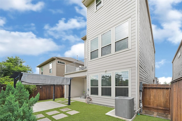 1909 Monaco Memorial Ln, Houston, TX 77043 - back of house featuring a balcony, a patio, and a jacuzzi