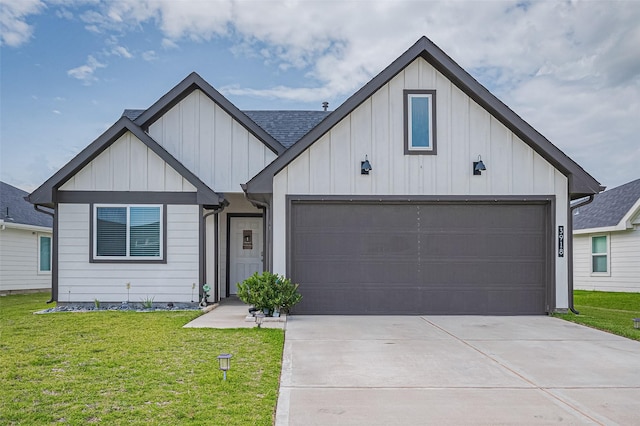 3918 Beltingham Bend Way, Fulshear, TX 77441 - view of front of house featuring board and batten siding, a front yard, driveway, an attached garage, and a shingled roof