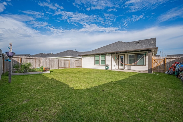 3918 Beltingham Bend Way, Fulshear, TX 77441 - rear view of house featuring a patio area, a fenced backyard, and a shingled roof