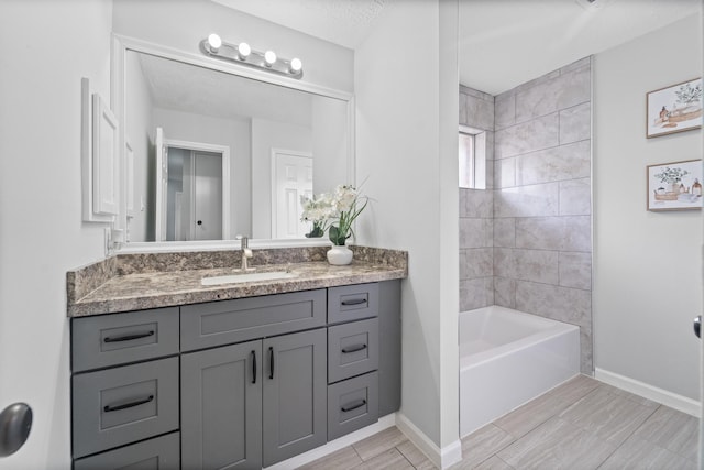 16310 Mulberry Run Ct, Sugar Land, TX 77498 - bathroom with vanity, wood tiled floors, and shower / bathtub combination