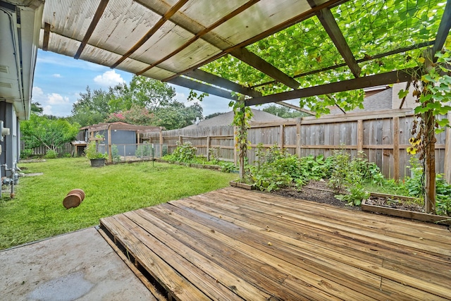 16310 Mulberry Run Ct, Sugar Land, TX 77498 - wooden deck featuring a vegetable garden and a fenced backyard