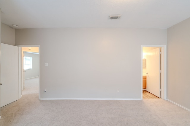 20027 Oland Way, Houston, TX 77073 - unfurnished room with light carpet and a smoke detector