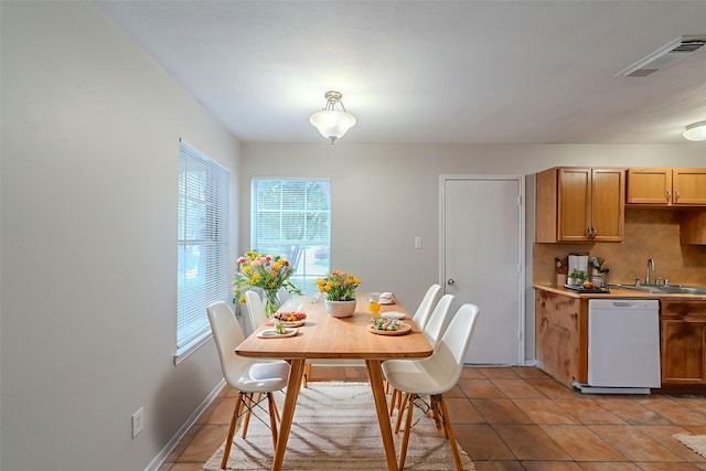 20027 Oland Way, Houston, TX 77073 - dining area featuring light tile patterned floors