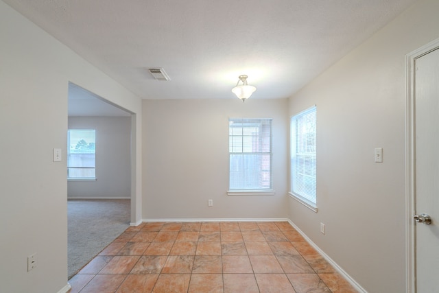 20027 Oland Way, Houston, TX 77073 - unfurnished room featuring plenty of natural light and light colored carpet