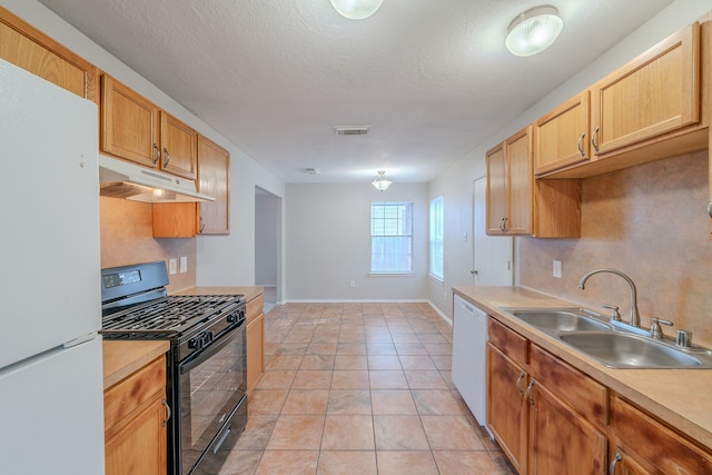 20027 Oland Way, Houston, TX 77073 - kitchen featuring white appliances, under cabinet range hood, light countertops, tasteful backsplash, and light tile patterned floors