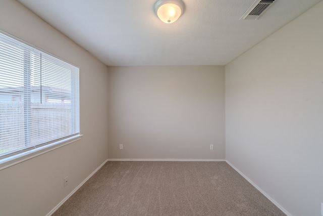 20027 Oland Way, Houston, TX 77073 - carpeted spare room with baseboards