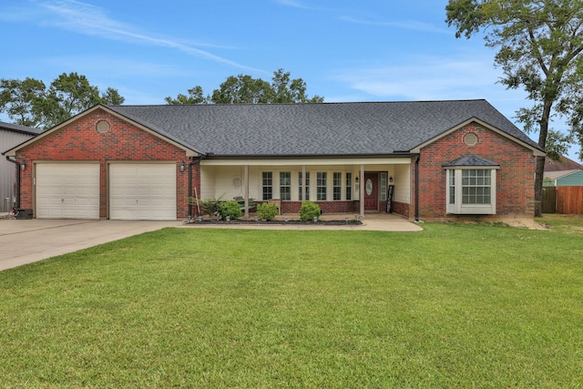6202 Oleander Dr, Baytown, TX 77523 - view of front of property featuring concrete driveway, an attached garage, brick siding, and a shingled roof