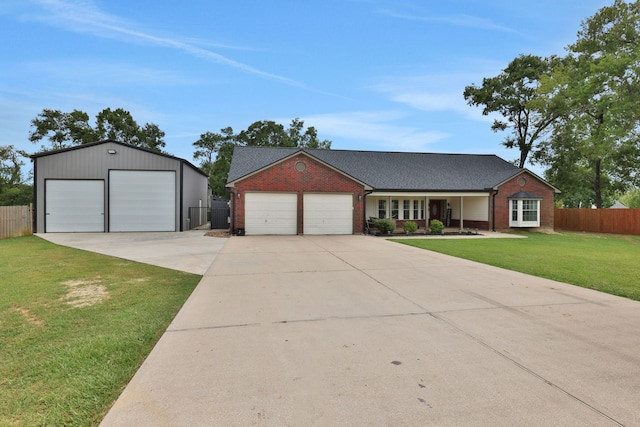 6202 Oleander Dr, Baytown, TX 77523 - view of front of home featuring brick siding, a garage, and a shingled roof