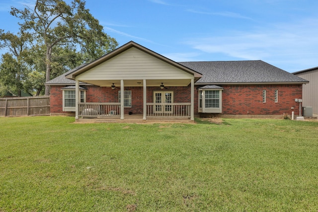 6202 Oleander Dr, Baytown, TX 77523 - rear view of property with ceiling fan, brick siding, and roof with shingles