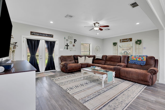 6202 Oleander Dr, Baytown, TX 77523 - living room with a ceiling fan, recessed lighting, wood finished floors, and ornamental molding