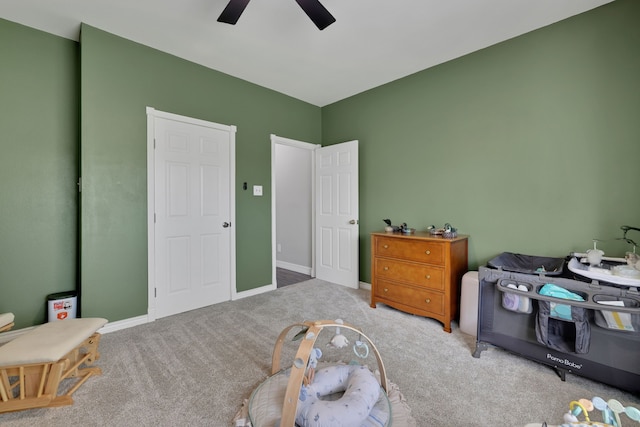 6202 Oleander Dr, Baytown, TX 77523 - carpeted bedroom with ceiling fan and baseboards