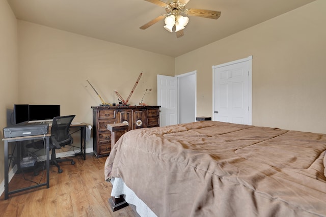 6202 Oleander Dr, Baytown, TX 77523 - bedroom with light wood-style flooring and ceiling fan