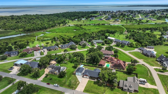 6202 Oleander Dr, Baytown, TX 77523 - aerial overview of property's location with a nearby body of water and nearby suburban area