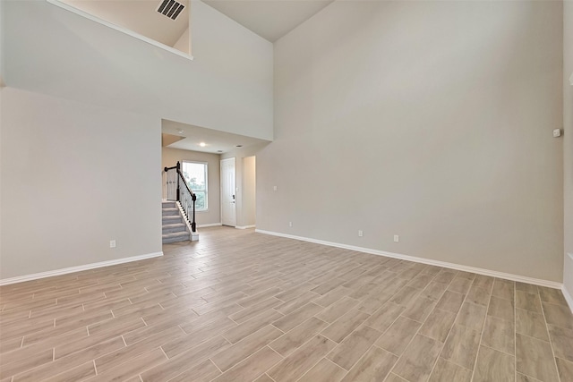 160 Majestic Shores Ln, La Porte, TX 77571 - spare room with stairway and light wood-type flooring