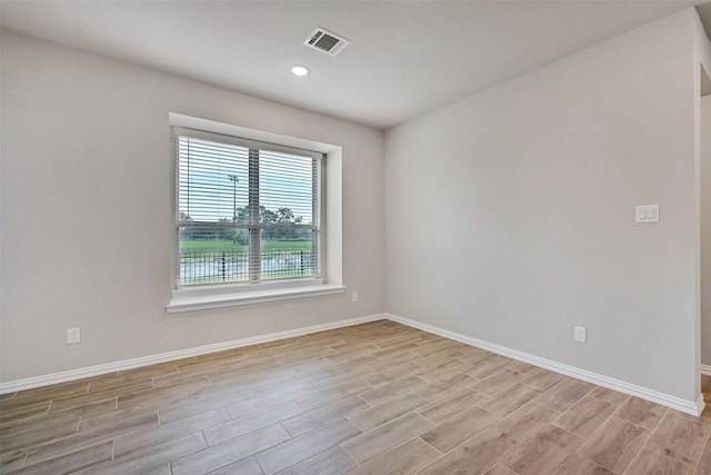 160 Majestic Shores Ln, La Porte, TX 77571 - unfurnished room with light wood finished floors and recessed lighting