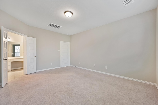 160 Majestic Shores Ln, La Porte, TX 77571 - unfurnished bedroom featuring light carpet and baseboards