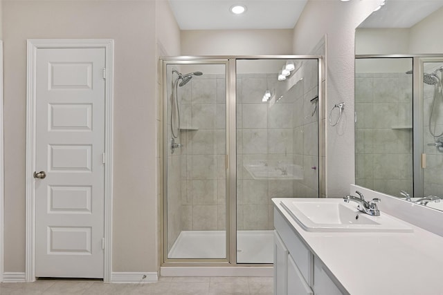 160 Majestic Shores Ln, La Porte, TX 77571 - bathroom with tile patterned flooring, a shower stall, and vanity