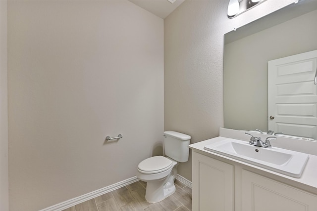 160 Majestic Shores Ln, La Porte, TX 77571 - half bathroom featuring vanity and wood finished floors
