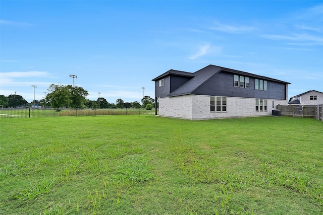 160 Majestic Shores Ln, La Porte, TX 77571 - back of house with a fenced backyard