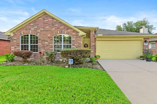 1126 Heathfield Dr, Channelview, TX 77530 - view of front facade with brick siding, a front yard, an attached garage, and concrete driveway