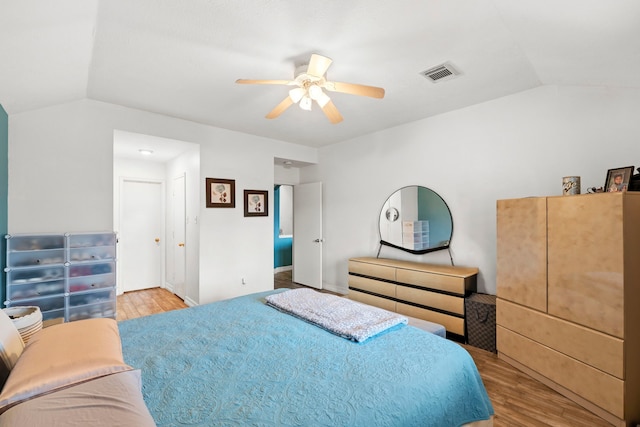 1126 Heathfield Dr, Channelview, TX 77530 - bedroom with lofted ceiling, wood finished floors, and a ceiling fan