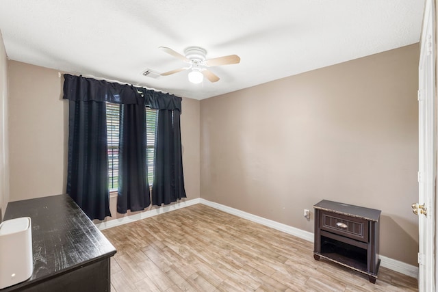 1126 Heathfield Dr, Channelview, TX 77530 - unfurnished room with a ceiling fan and light wood-type flooring