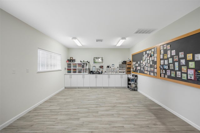 21215 Kelliwood Greens Dr, Katy, TX 77450 - miscellaneous room featuring light wood finished floors and baseboards