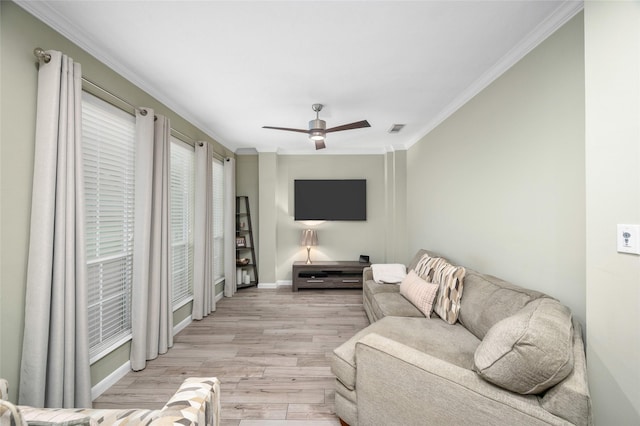 21215 Kelliwood Greens Dr, Katy, TX 77450 - living area featuring ornamental molding, light wood finished floors, and ceiling fan