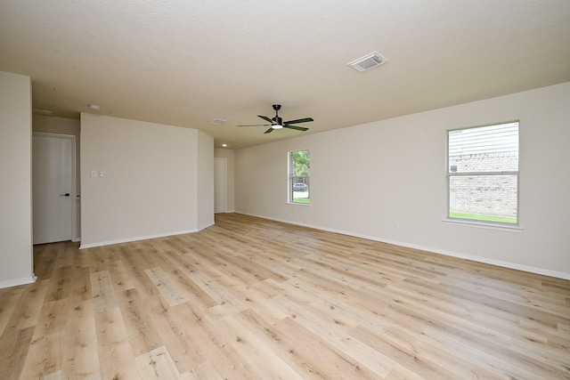 2046 Grand Park Dr, Missouri City, TX 77489 - spare room with light wood-type flooring and a ceiling fan
