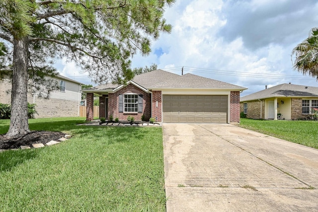 2046 Grand Park Dr, Missouri City, TX 77489 - ranch-style house with a garage, concrete driveway, brick siding, and a front yard