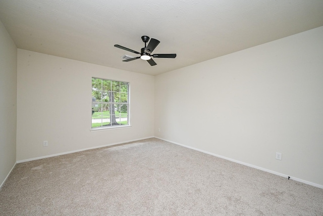 2046 Grand Park Dr, Missouri City, TX 77489 - carpeted empty room featuring baseboards and ceiling fan