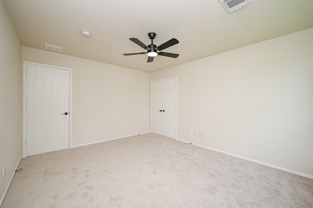 2046 Grand Park Dr, Missouri City, TX 77489 - carpeted spare room with a ceiling fan and a smoke detector