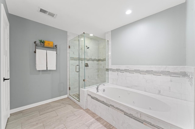 4303 Jonathan St, Bellaire, TX 77401 - full bath featuring a jetted tub, a shower stall, and recessed lighting