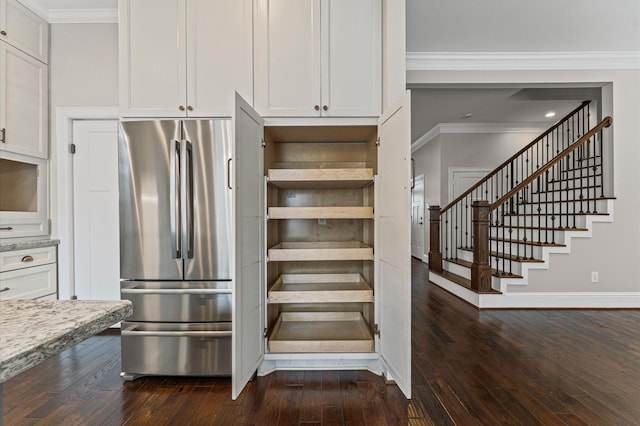 4303 Jonathan St, Bellaire, TX 77401 - stairway with ornamental molding and hardwood / wood-style flooring