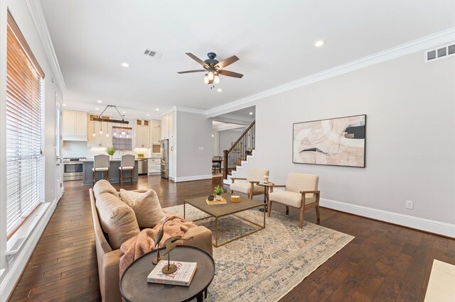 4303 Jonathan St, Bellaire, TX 77401 - living area with ceiling fan, ornamental molding, stairway, dark wood-style flooring, and recessed lighting