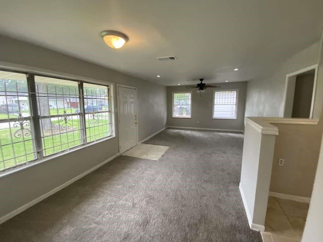 5322 Dewberry St, Houston, TX 77021 - unfurnished living room featuring a ceiling fan, carpet flooring, and recessed lighting