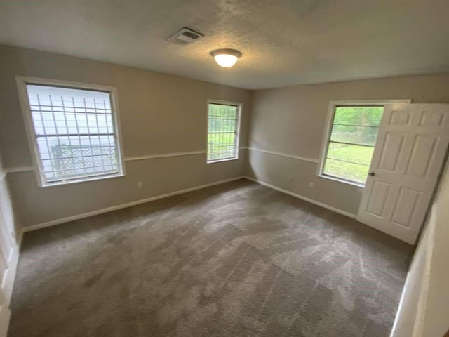 5322 Dewberry St, Houston, TX 77021 - carpeted empty room with baseboards