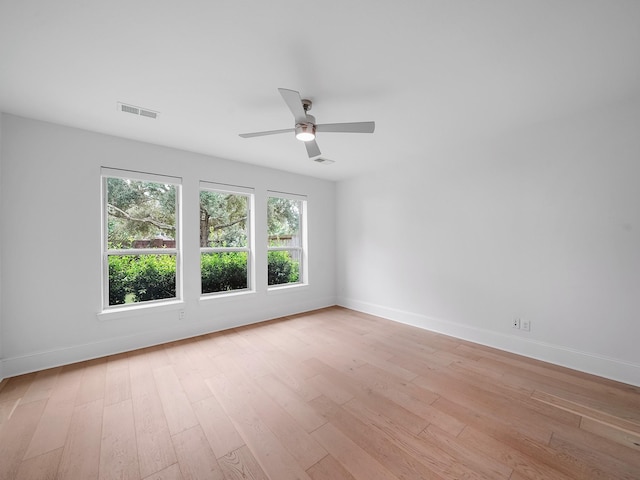 28111 Harper Creek Ln, Katy, TX 77494 - spare room with light wood finished floors and a ceiling fan