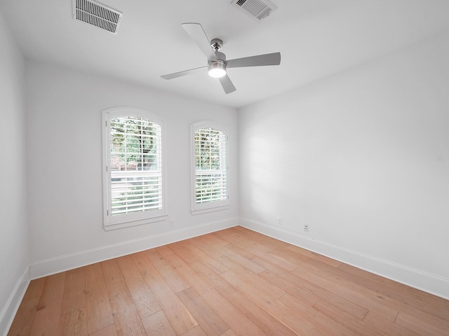 28111 Harper Creek Ln, Katy, TX 77494 - empty room featuring light wood finished floors and a ceiling fan