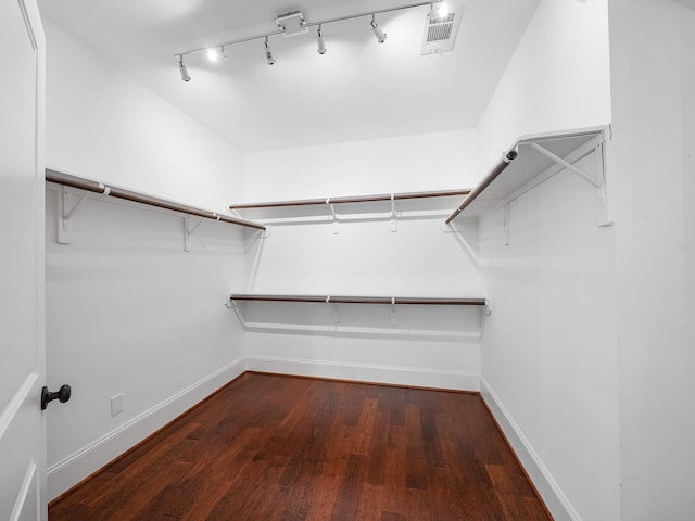 28111 Harper Creek Ln, Katy, TX 77494 - walk in closet featuring hardwood / wood-style flooring