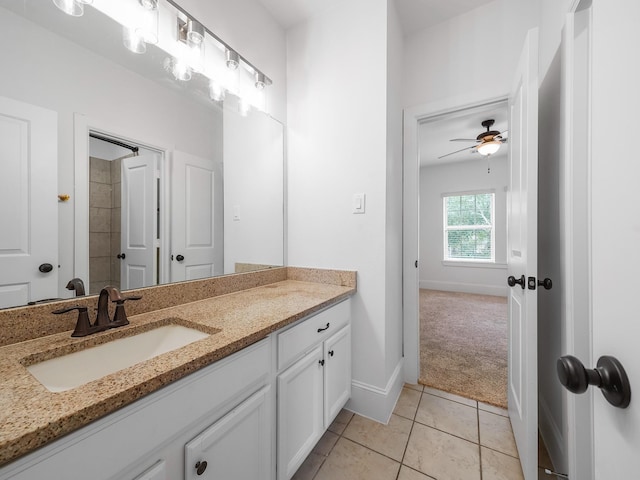 28111 Harper Creek Ln, Katy, TX 77494 - full bathroom with vanity, a ceiling fan, and tile patterned floors