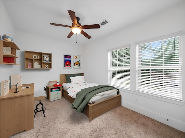 28111 Harper Creek Ln, Katy, TX 77494 - carpeted bedroom with baseboards and ceiling fan