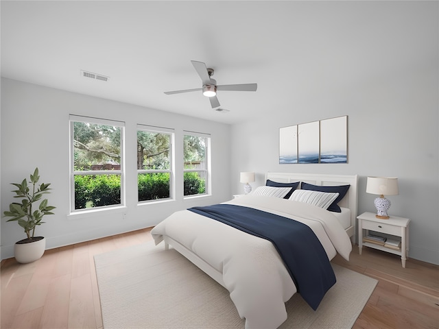 28111 Harper Creek Ln, Katy, TX 77494 - bedroom with wood finished floors and ceiling fan