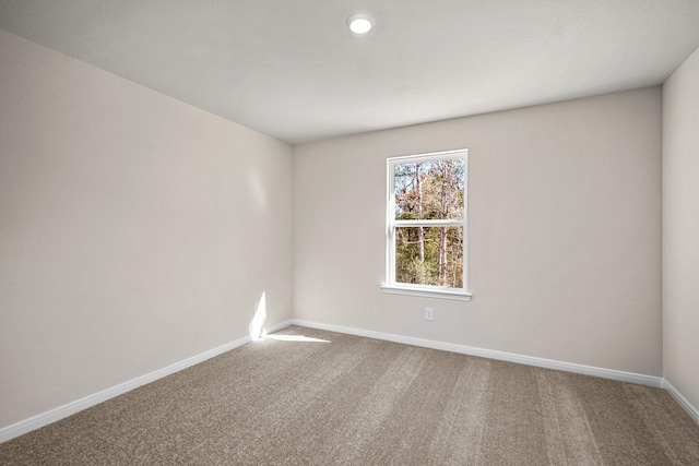 10377 Red Cardinal Dr, Cleveland, TX 77328 - spare room featuring carpet and recessed lighting