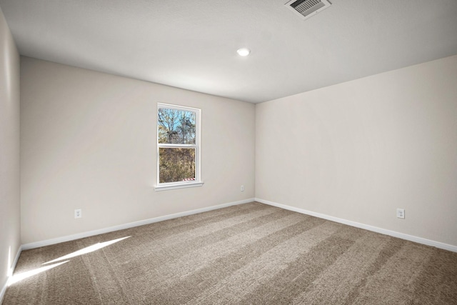 10377 Red Cardinal Dr, Cleveland, TX 77328 - spare room featuring carpet and baseboards