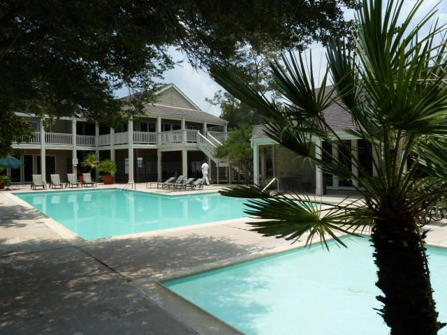 2100 Tanglewilde St Unit 360, Houston, TX 77063 - community pool featuring a patio area