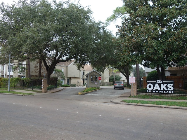 2100 Tanglewilde St Unit 360, Houston, TX 77063 - view of street featuring traffic signs, sidewalks, and curbs