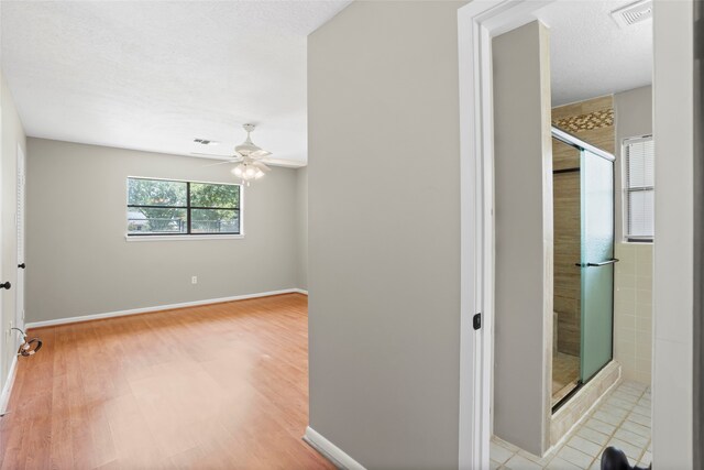 3808 Montego Dr, Baytown, TX 77521 - hallway featuring light wood-style flooring